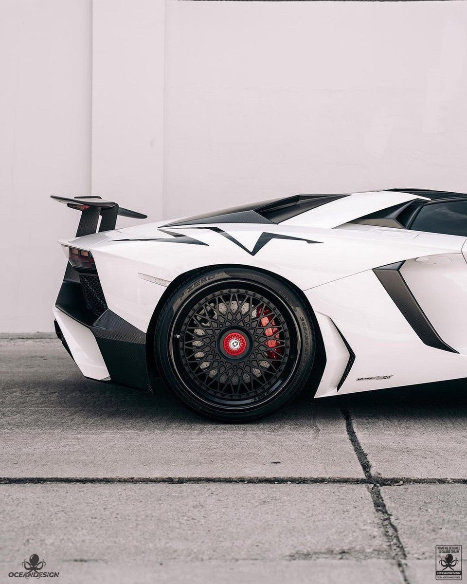 Lamborghini Aventador SV carbon fiber rear wing and side intake rear three-quarter view