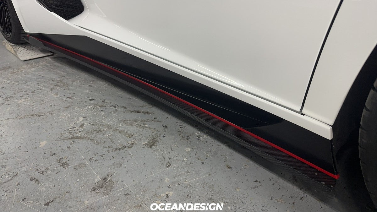 Lamborghini Aventador SV carbon fiber side skirt with red trim close-up